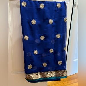 Blue sari with gold work